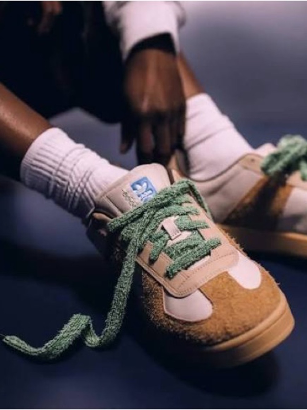 adidas sneaker detail in cream, tan & mint green